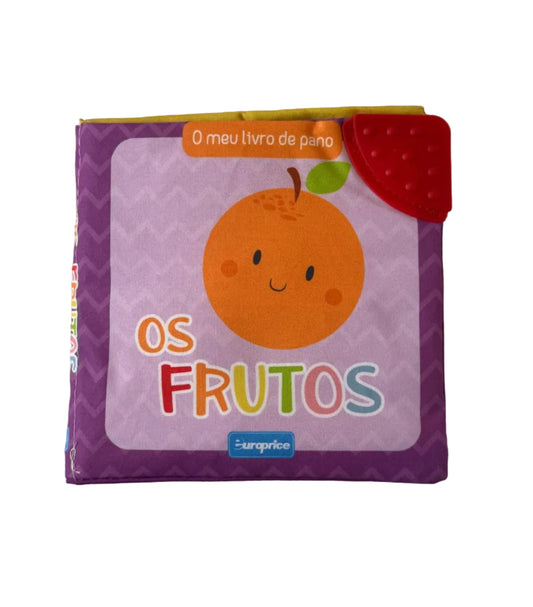 Children's book titled 'Os Frutos' on a textured surface