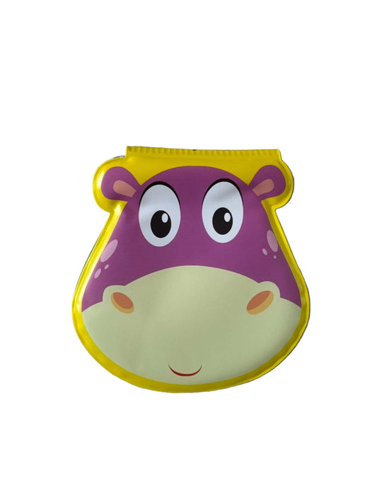 Children's toy with a purple and yellow hippo design on a textured gray background