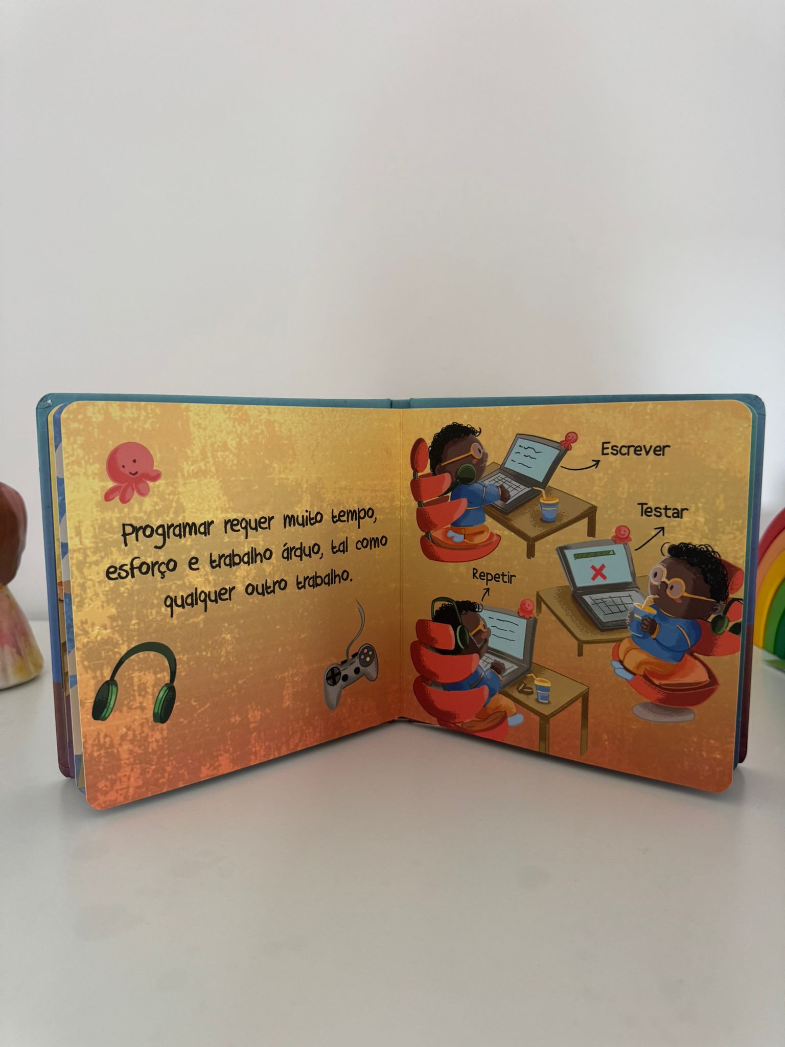 Open book with illustrated pages on a white background