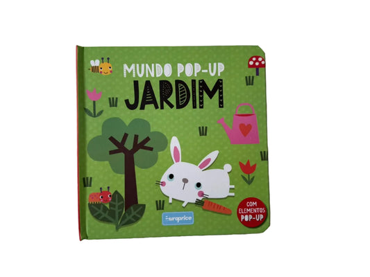 Children's book with a green cover featuring cartoon characters on a gray fabric background